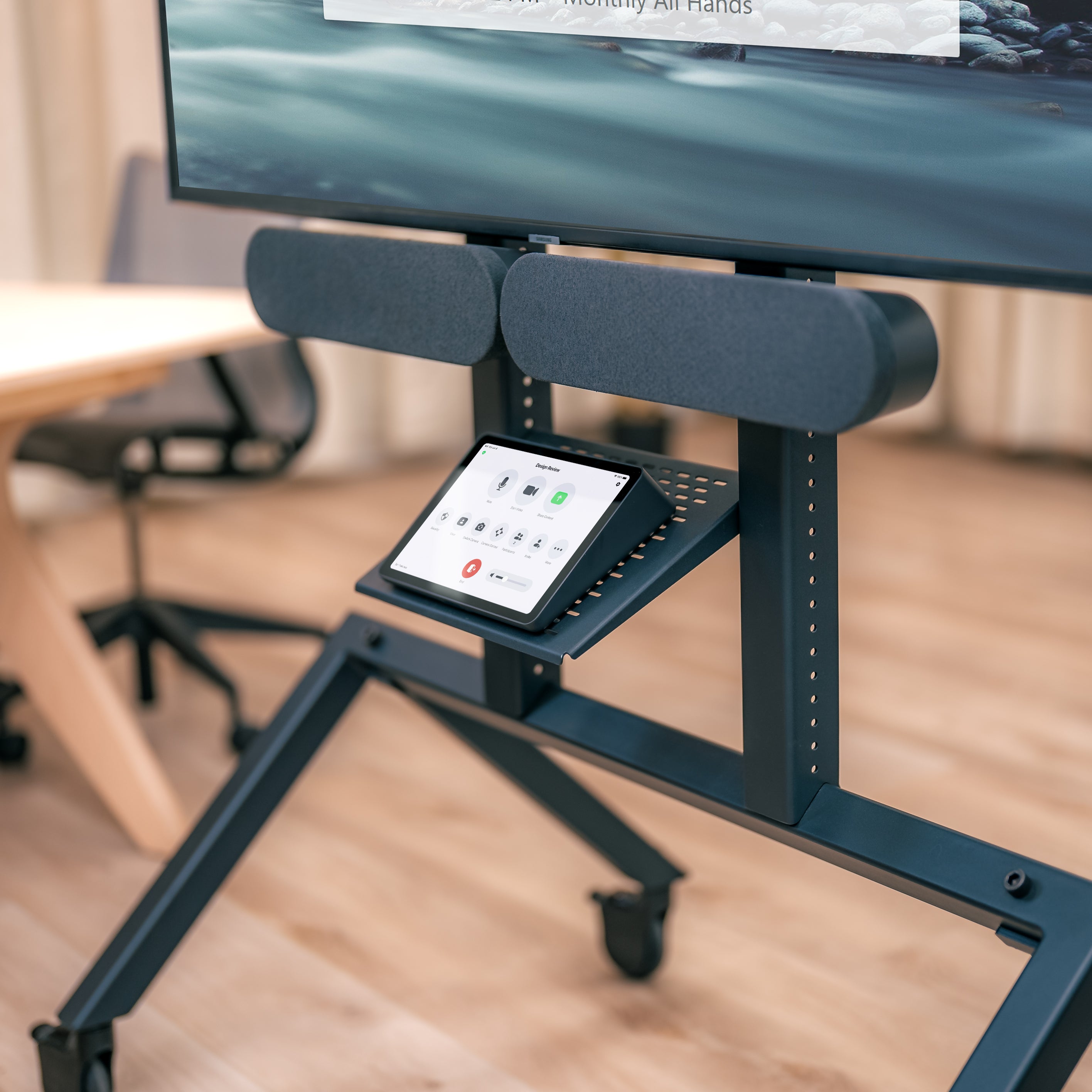 Soundbar Mount installed on Heckler AV Cart with Logitech Rally Speaker below display