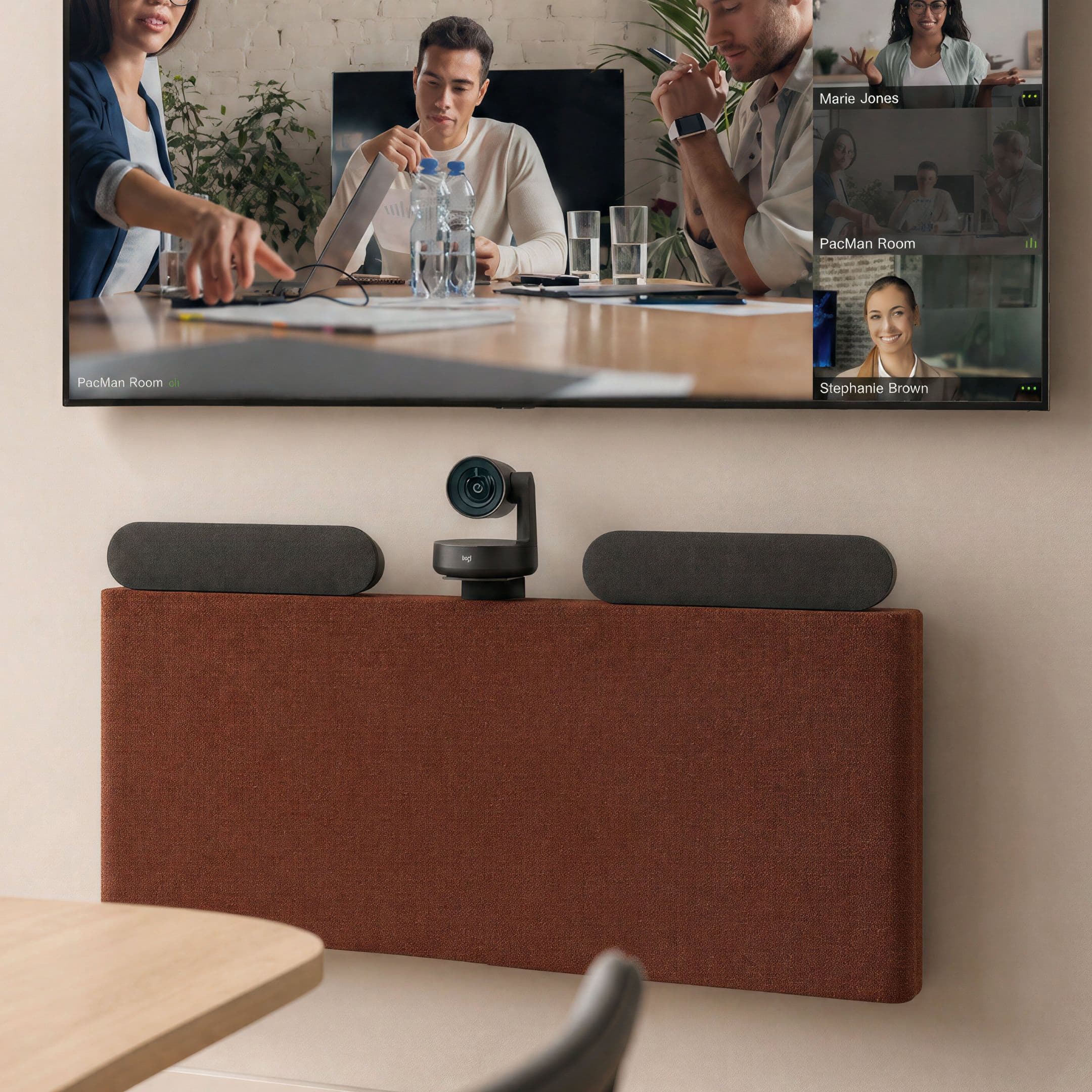 Heckler Credenza below a display in a modern meeting room.