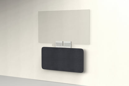 Heckler Credenza Neo in Ebony — wall-mounted AV credenza with ebony black acoustic felt panel concealing components below a display.