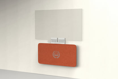 Heckler Credenza Neo in Moab with custom logo — wall-mounted AV credenza with branded terracotta rust acoustic felt panel concealing components below a display.