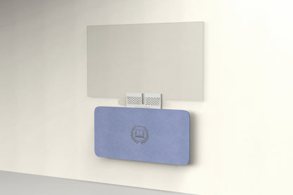 Heckler Credenza Neo in Periwinkle with custom logo — wall-mounted AV credenza with branded periwinkle blue acoustic felt panel concealing components below a display.