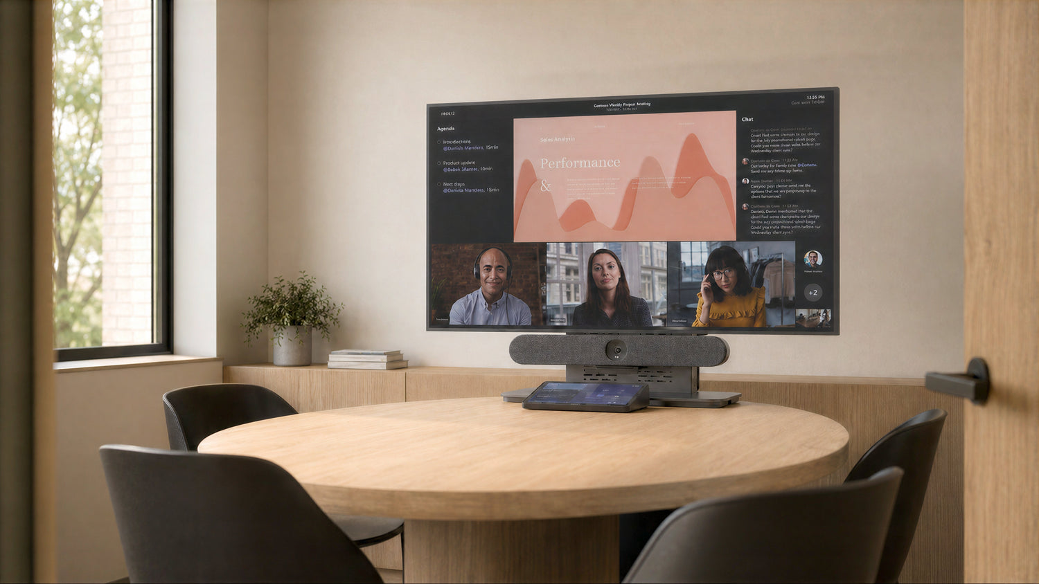 Heckler Express Install Tabletop Stand in a meeting room with display and camera.