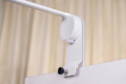 Heckler Whiteboard Mount — locking tab securing Logitech Scribe base