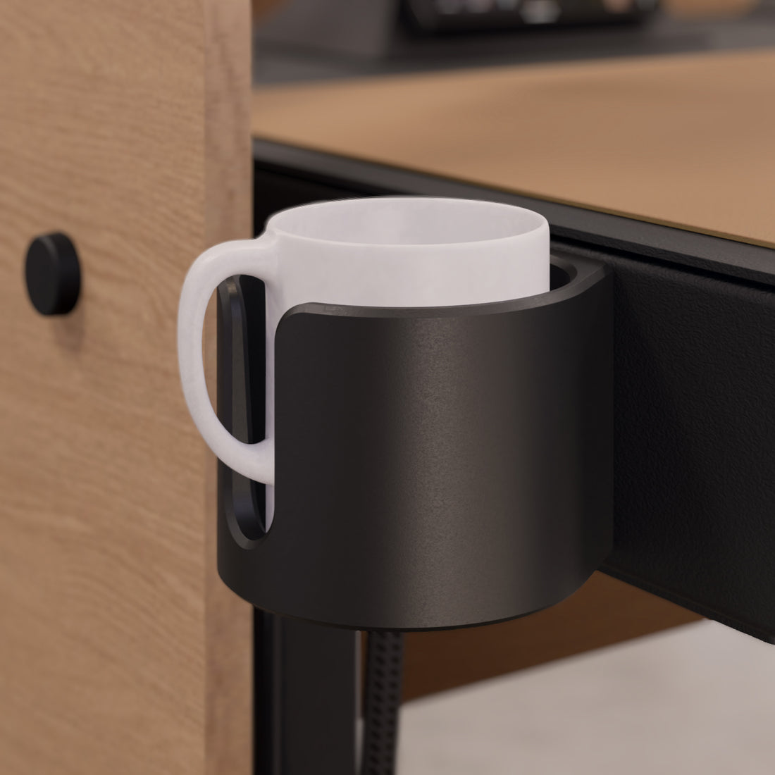 Cup Holder for Heckler Lectern — Black cup holder mounted on Heckler Lectern side, lifestyle view