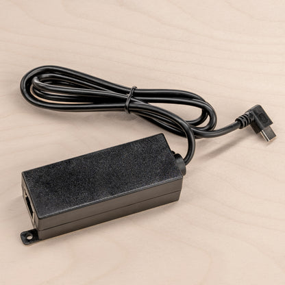 PoE to USB-C Power and Data Adapter T519, product photo showing adapter with integrated right-angle USB-C cable