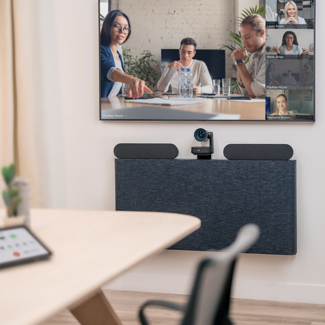 Heckler AV Credenza 4U in Black Grey mounted on conference room wall