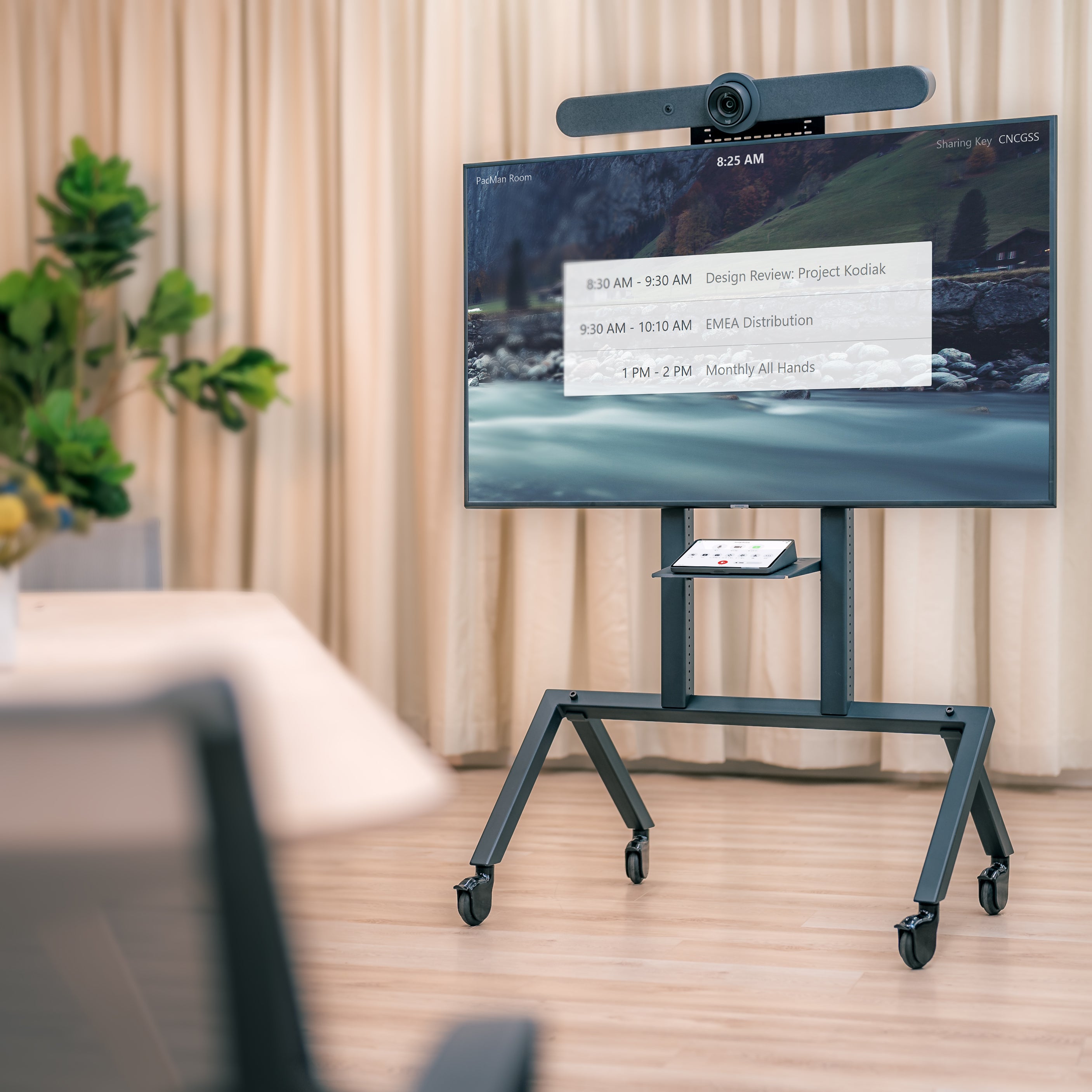 Heckler AV Cart with Rally Bar mounted above display using Cart Mount
