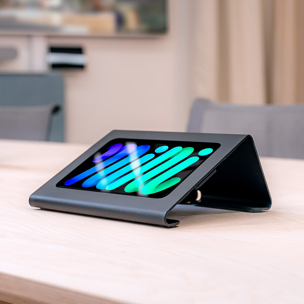Heckler Meeting Room Console for iPad mini, front view showing low-profile tabletop enclosure