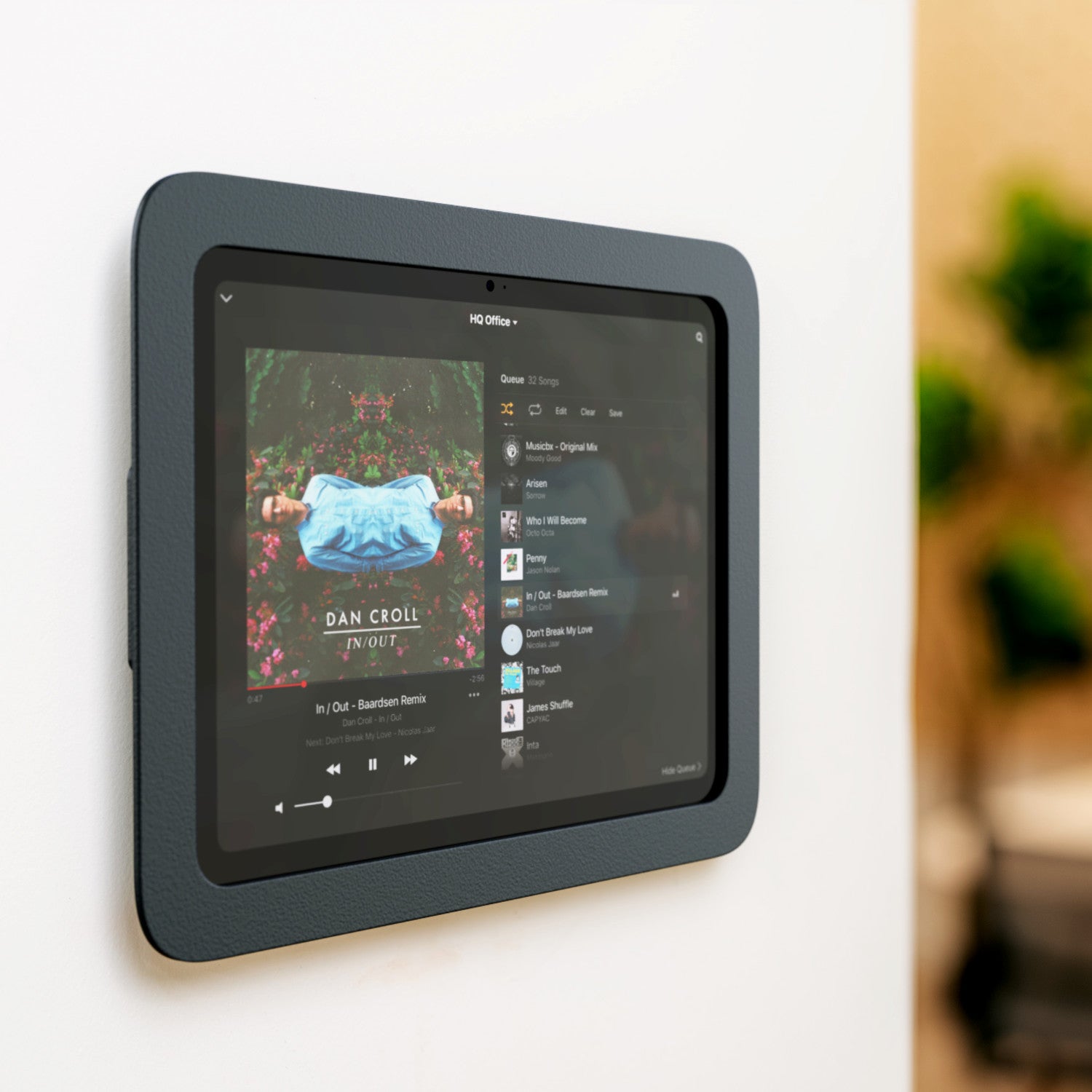 Heckler Wall Mount MX with iPad powered on — flush wall-mounted display