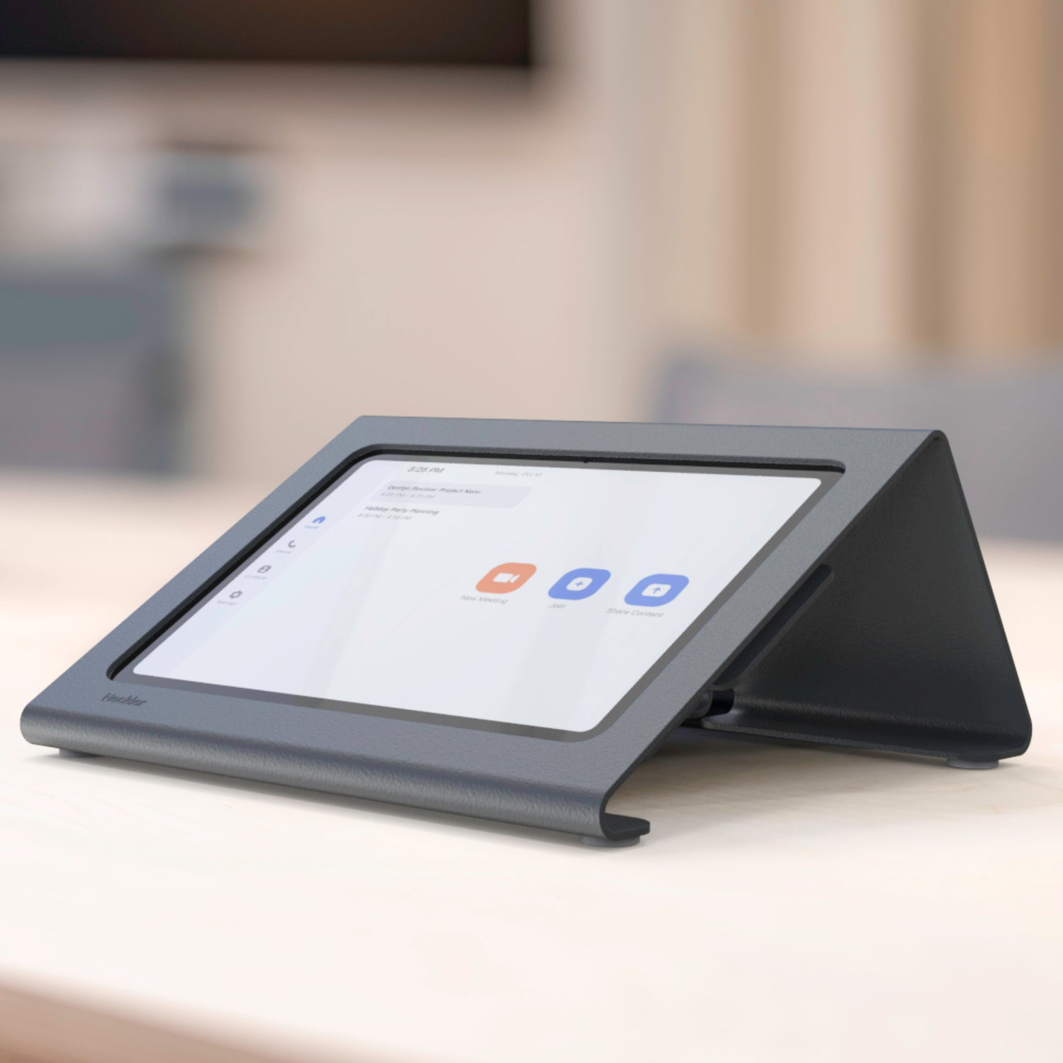 Heckler Meeting Room Console with iPad powered on displaying room booking interface