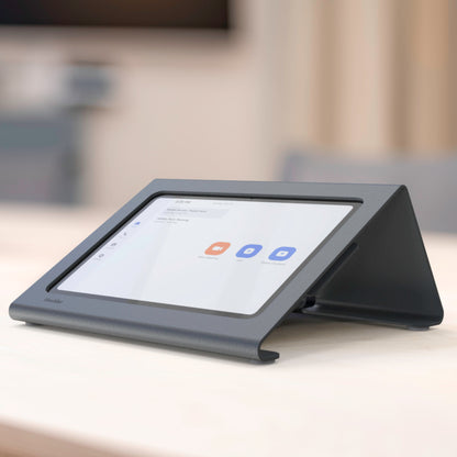 Heckler Meeting Room Console with iPad powered on displaying room booking interface
