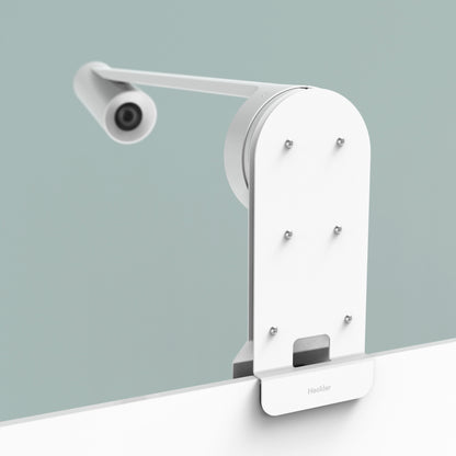 Heckler Whiteboard Mount installed on whiteboard with Logitech Scribe — meeting room