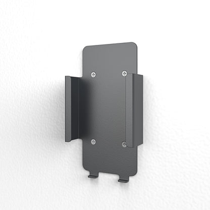 Power Adapter Mount for Google Meet Series One installed behind display — wall mount configuration